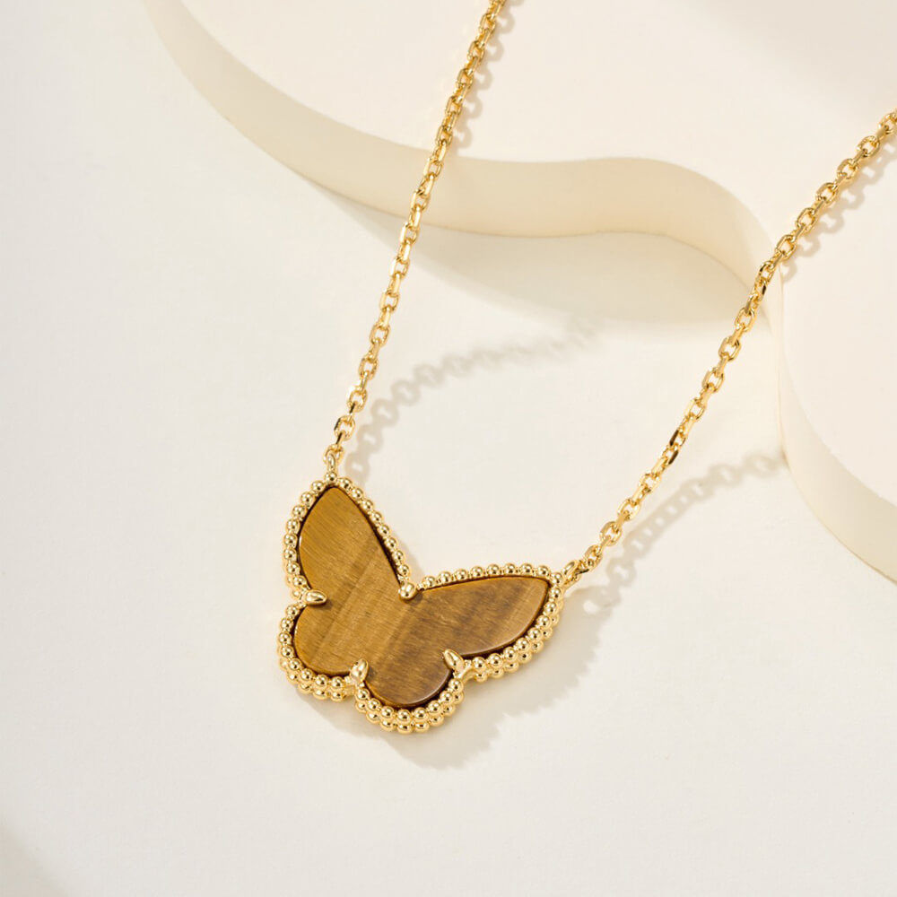 V*n Cl**f & Arpels Lucky Alhambra butterfly pendant